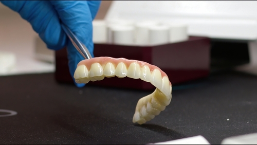 Denture Stabilization in Syracuse, NY | Free Implant Consultations