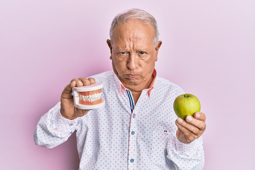 Implantes de Dentadura Inferior en Syracuse, NY | Consultas Gratuitas