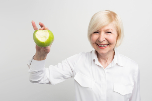 Implant With Dentures in Syracuse, NY | Free Implant Consultation